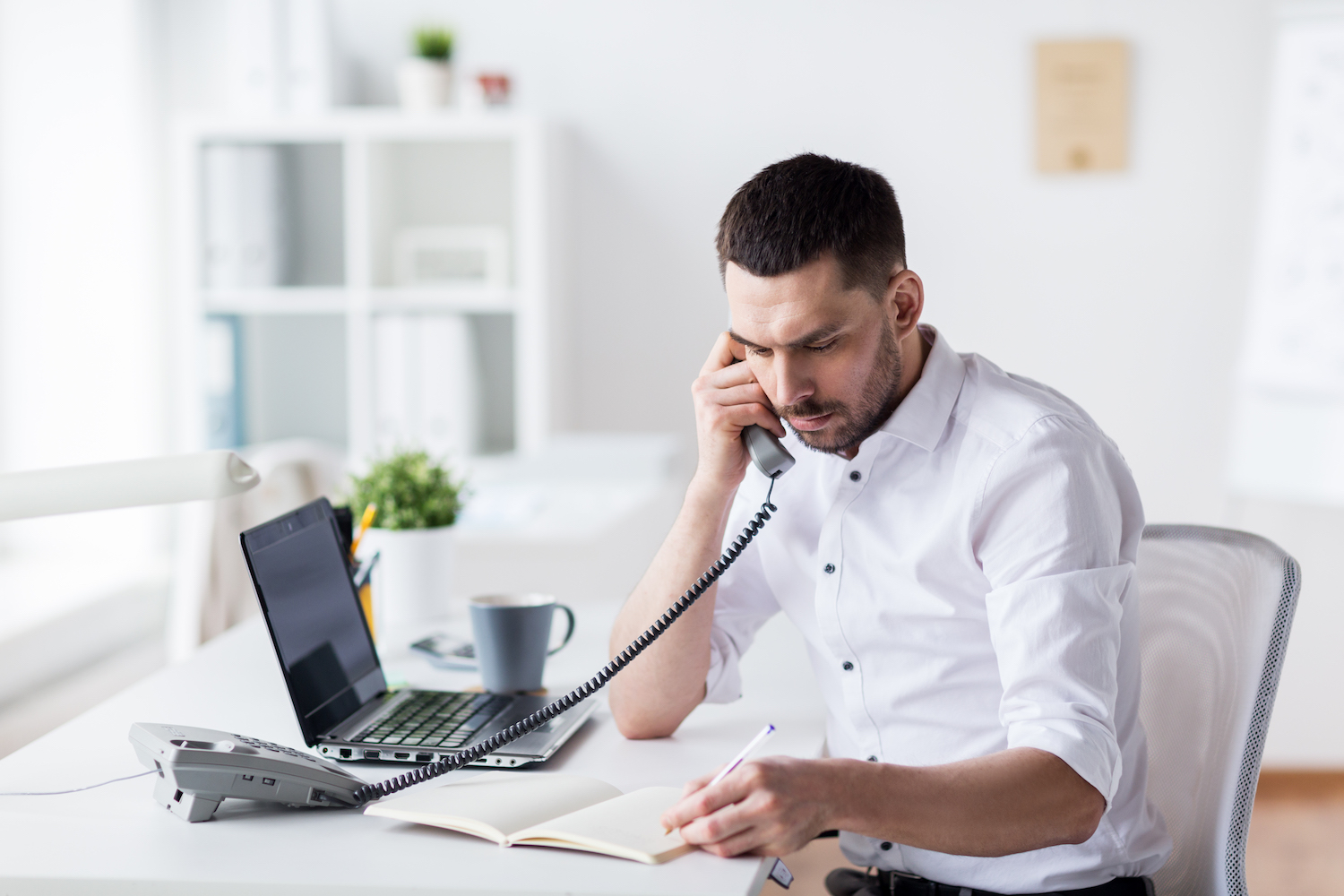 Office team using business desk phones
